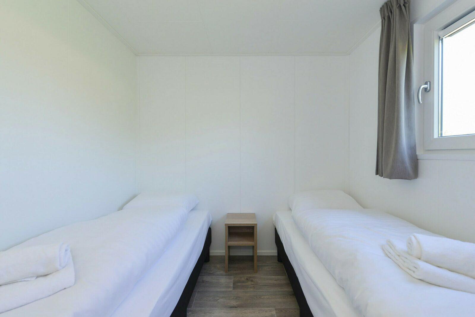 Slaapkamer in chalet Vakantiepark Hart van Zeeland
