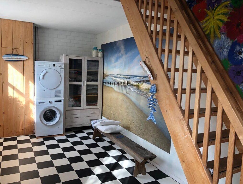 steile trap naar het woonvertrek