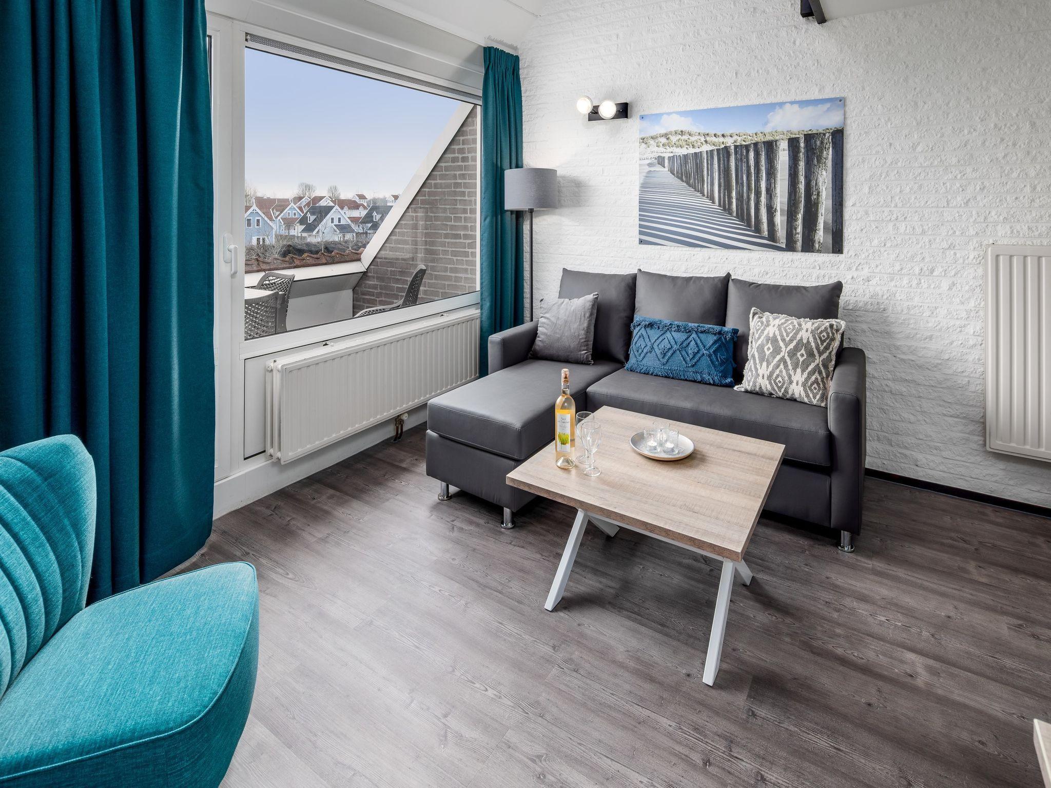 Gerestyld appartement voor vier personen op vakantiepark Aquadelta bij Grevelingenmeer