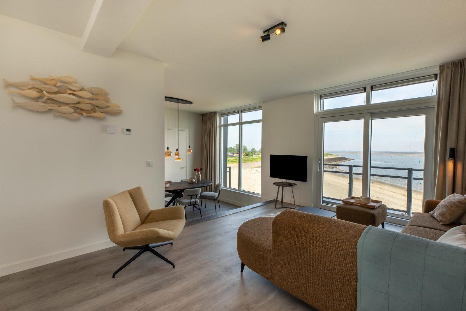Woonkamer Vista Maris - Havenweg 36-12 'Zeildroom' | Sint-Annaland