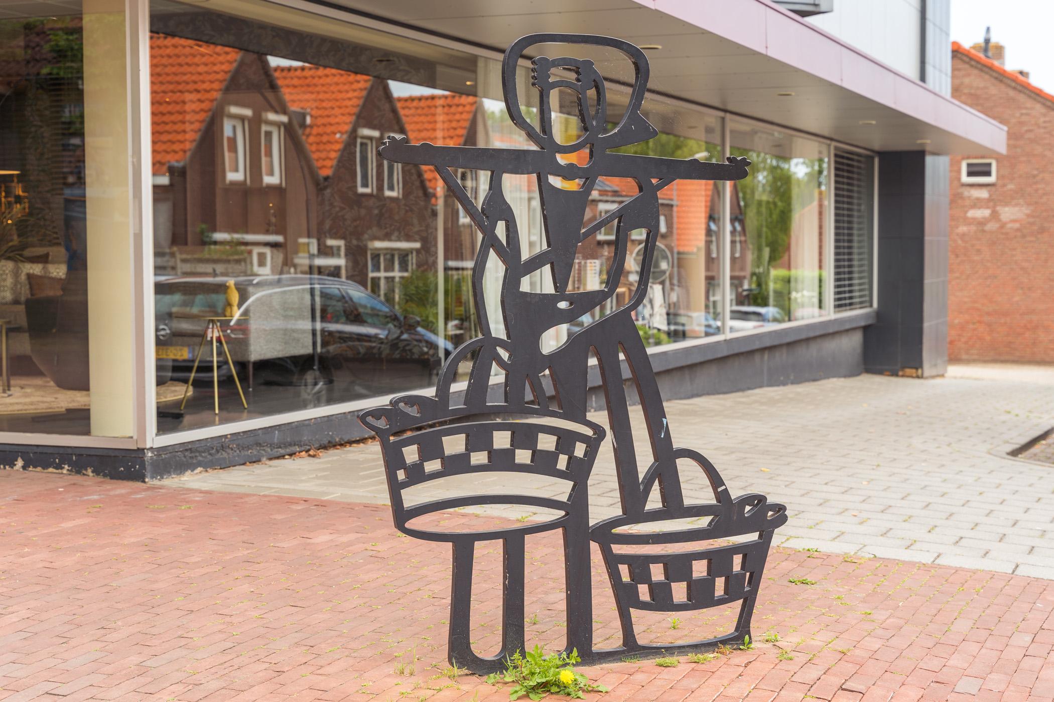 Arnemuiden kunst: vrouw in klederdracht